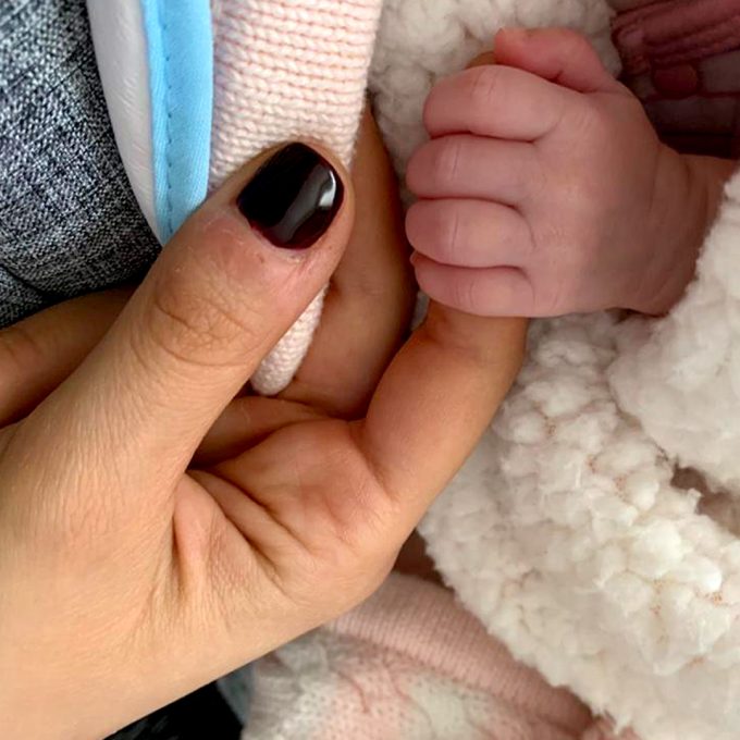 Mother and baby hands