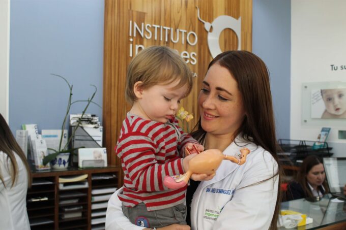 Doctor with IVF and small child