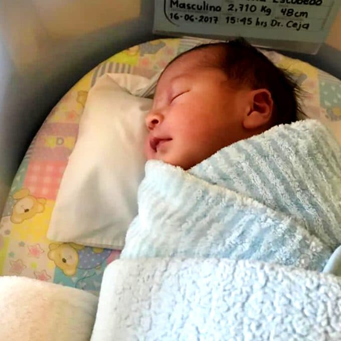 healthy baby born through IVF with emotional support